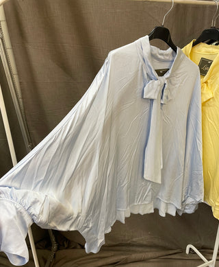 Blus med rosett
