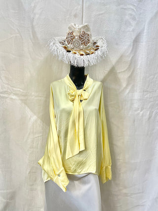 Blus med rosett
